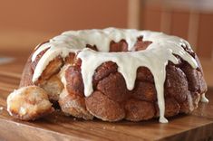 a bundt cake sitting on top of a wooden cutting board