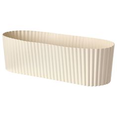 a white ribbed dish is shown on a white background and it looks like pleated paper