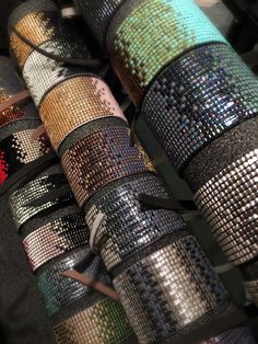 many different colors of sequins are lined up together