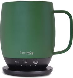 the nextmug coffee mug is green with black rims and features a built - in charging station