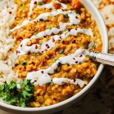 a white bowl filled with rice and beans