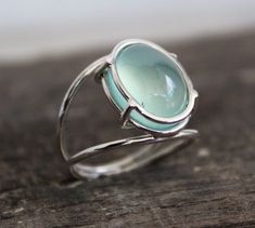 Aqua chalcedony ring, Handmade Silver Rings, March  Birthstone, Aqua Gemstone Ring, Blue Gemstone Ring, Rings for Women,Large silver ring....................................................................Aqua chalcedony is Birthstone of MarchEmotionally, this stone overcomes depression and anxiety, replacing it with trust and poise. It is the perfect stone for resolving the head-heart dilemma, teaching how to live from a compassionate heart with an illumined mind.Natural Aqua chalcedony Ring. A Stone Ring Design Silver For Women, Silver Ring With Stones For Women, Silver Rings With Stones Gemstones, Silver And Gemstone Jewelry, Silver Ring Stone, Coke Cake, Handmade Silver Rings, Wild Jewelry, Silver Gemstone Rings