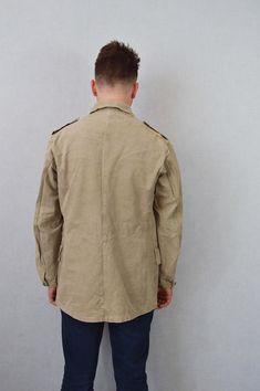 "Vintage Stone Canvas Chore Worker Jacket - 100% Cotton Tough Faded Military - S M L XL Rugged tailored military design in a stunning faded stone wash grey/desert brown canvas fabric that makes the perfect midweight jacket. Metal buttons, two front pockets and epaulettes to shoulders. Most will not be decorated but there may be a few with badges to collar or chest which can be easily removed if desired. - Original Swedish tagging within - Unlined - Dated 1950s-60s - Made from thick, durable cott Military Style Khaki Sport Coat For Fall, Fitted Military Utility Jacket In Khaki, Military Style Khaki Sport Coat With Flap Pockets, Military Style Khaki Blazer With Flap Pockets, Khaki Military Blazer With Flap Pockets, Khaki Long Sleeve Sport Coat For Hunting, Long Sleeve Khaki Sport Coat For Hunting, Vintage Khaki Utility Jacket For Winter, Vintage Olive Utility Jacket For Fall