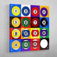 a poster with different colored pool balls and numbers on the front, in various colors