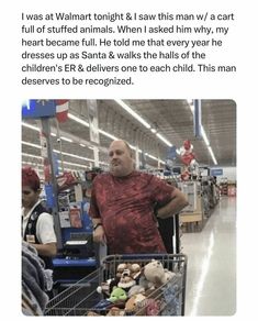 an older man in a red shirt is pushing a shopping cart with stuffed animals on it