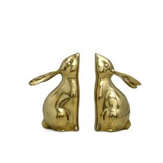 pair of gold rabbit bookends on white background