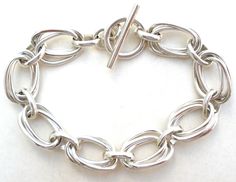 Sterling Silver Triple Link Bracelet ATI Mexico Modern Oval Sterling Silver Bracelet, Sterling Silver Oval Bracelet, Modern Sterling Silver Oval Chain Bracelet, Silver Oval Link Chain Bracelet, Silver Oval Chain Bracelet With Polished Finish, Sterling Silver Oval Link Chain Bracelet, Sterling Silver Oval Link Bracelet With Polished Finish, Oval Bracelet With Sterling Silver Clasp In Silver, Oval Silver Bracelet With Sterling Silver Clasp