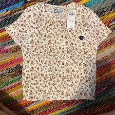 Nw Floral Baby Tee. Size Small, Fits More Like An Xs But It’s Stretchy Material. Casual White Tops With Floral Print, White Floral Print Crew Neck Top, Red Printed Short Sleeve Top, Trendy Printed Red Tops, Red Floral Print Crew Neck Blouse, Red Crew Neck Blouse With Floral Print, Trendy Red Printed Top, Cute Red Crew Neck Top, Red Floral Print T-shirt For Summer