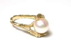 Beautiful 14k Yellow Gold Pearl Ring Price ReducedSize 5.53.7 GramsFEEL FREE TO MESSAGE ME WITH A BEST OFFER!121112-947Please contact me if you are interested in purchasing multiple items, I am happy to negotiate and accommodate any request!_________________________________________________________________________* Back to Shop Watch and Wares? https://www.etsy.com/shop/watchandwares* Ready to purchase? Click the green button "Add to cart" * Have a question? Click the button "Ask a question" * Wa Handmade Gold Pearl Ring For Formal Occasions, Unique Gold Pearl Ring For Formal Occasions, Unique Yellow Gold Pearl Ring For Wedding, Unique Yellow Gold Pearl Ring For Anniversary, Unique 14k Yellow Gold Pearl Ring, Unique 14k Gold Pearl Wedding Ring, Unique 14k Gold Pearl Ring For Wedding, Gold Pearl Ring, Bamboo Design