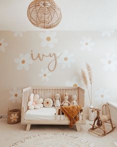 a baby's room decorated in pink and gold