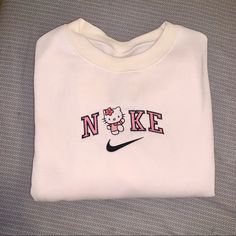 Embroidered Crewneck Super Cute! Size Medium Ivory Great Quality 100% Cotton Nike Sweatshirts Vintage Pink, Cheap Multicolor Hello Kitty T-shirt, Shop Teen Clothes, Hristmas Gifts For Teens, Cheap Hello Kitty Short Sleeve T-shirt, Nike Cow Crewneck, Embroidered Nike Sweaters, Pull Nike Stitch, Hello Kitty Forever 21 Hoodie