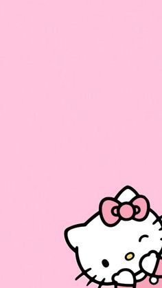 the hello kitty wallpaper is pink and has an image of a cat on it