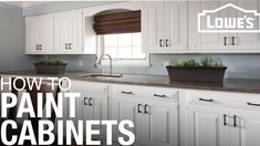 a kitchen with white cabinets and granite counter tops in front of a window that says how to paint cabinets