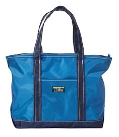 This versatile, lightweight tote bag is a must-have for hauling gear to the beach, carrying groceries home from the market or keeping handy in your car. Durable, lightweight nylon fabric. Double-layer bottom. Medium-length reinforced handles. Zip-top closure. Exterior open slot pocket. Interior zip pocket with key clip. Contrasting stitch details. Available in a variety of bright colors. Imported. | Everyday Lightweight Tote Easter Tote Bags, Personal Organizer, Travel Tote Bag, Blue Tote, Key Clip, Travel Items, Travel Tote, Bags Travel, Grab Bags