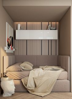 a bed sitting in the middle of a bedroom next to a wall mounted book shelf