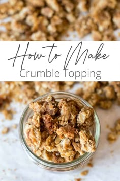 a glass jar filled with granola sitting on top of a white table next to a pile of granola