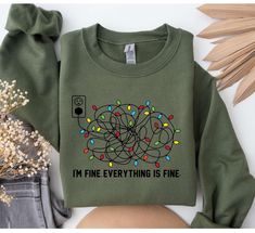 Introducing the "I'm Fine Everything Is Fine Sweatshirt" - the perfect Christmas sweatshirt for women who want to stay comfortable and stylish both at everyday gatherings and holiday parties. Made from a soft and cozy fabric, this sweatshirt features a festive Christmas lights design that will surely put you in the holiday spirit. Popular features - Festive Christmas lights design - Perfect for everyday use and holiday gatherings Get a sweatshirt that will make you feel festive and fabulous this holiday season. Don't miss this must-have Christmas sweatshirt for women. Add it to your cart now! ---------- How to Order Your Custom Design T-shirt ---------- * Choose your t-shirt color * Choose your size * PLEASE make sure all your order's steps *Confirm your order -We use Bella Canvas,Circle C I'm Fine, Sweatshirt Women, Everything Is Fine, Women Christmas, Sweatshirt Christmas, Look Plus, Christmas Women, Christmas Sweatshirts, Christmas Humor