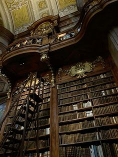 an old library with many bookshelves and clocks