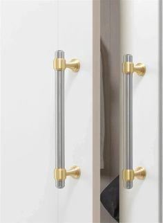 two doors with handles and knobs are shown in this image, one is white and the other is gold