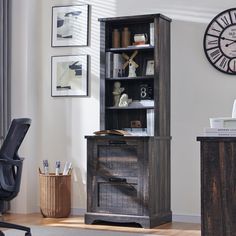 an office with a desk, chair and bookcase in the corner next to a clock on the wall