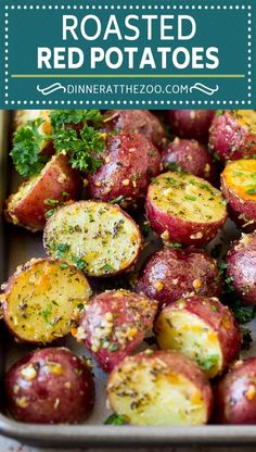 roasted red potatoes with herbs and seasoning in a baking pan