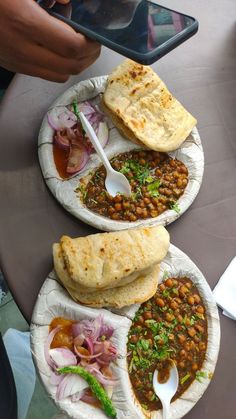 two paper plates with different types of food on them, one being spooned out