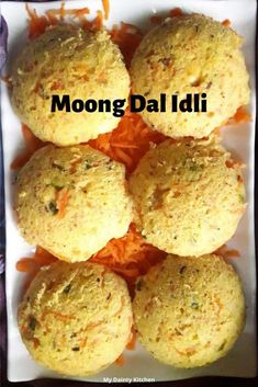 moong daldi with carrots in the middle on a square white platter