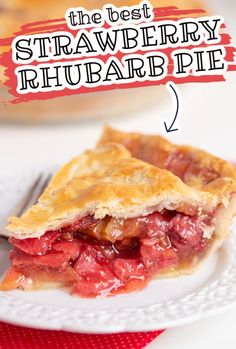 the best strawberry rhubarb pie is on a white plate with a fork