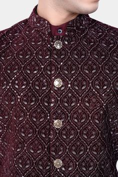 Elevate your ensemble with our Aubergine Maroon Nehru Jacket adorned with exquisite sequins and thread embroidery, perfect for weddings, engagements, or parties. This versatile piece seamlessly transitions from formal to casual wear, adding a touch of sophistication to any outfit. Pair it effortlessly with a kurta jacket set for a complete look. Embrace timeless elegance and make a statement with this meticulously crafted Nehru jacket designed for men of discerning taste. In addition to being co Traditional Drape Nehru Jacket With Intricate Embroidery For Party, Nehru Jacket With Intricate Embroidery For Party, Nehru Jacket With Mirror Work For Wedding Eid, Nehru Jacket With Mirror Work For Diwali Wedding, Nehru Jacket With Mirror Work For Wedding And Diwali, Wedding Nehru Jacket With Mirror Work For Diwali, Eid Wedding Nehru Jacket With Mirror Work, Festive Fitted Embellished Nehru Jacket, Diwali Wedding Nehru Jacket With Mirror Work