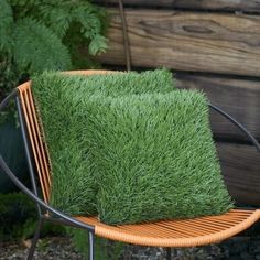 a chair that has some grass on it