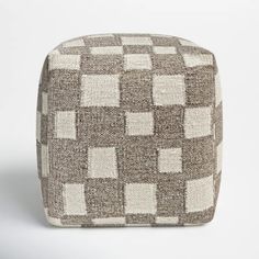 a brown and white checkerboard pattern poufce on a white background,