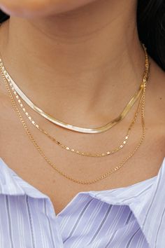 Enhance any outfit with our Gold Triple Layer Chain Link Necklace! Featuring three layers of assorted chain links, this necklace adds a touch of elegance and versatility. Perfect for any occasion, this necklace is a must-have for your jewelry collection. Revival Clothing, Layer Chain, Fall Style Guide, Gameday Dress, Casual White Dress, Concert Looks, Layered Chains, Game Dresses, Chain Links