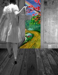 a woman in a white dress is walking towards an open door with a rainbow painted on it