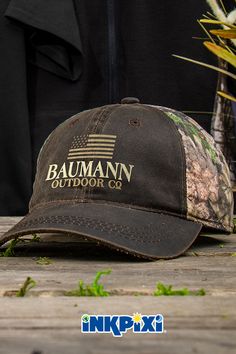 An American Outdoor Company custom 2-tone camo hat is the perfect gift for the man who's proud of his country & loves nature. Get one personalized for everyone in the family. #inkpixi #personalizedgifts #customhats #personalizedhats #custom #personalized #hats #twotoned #twotonedhats #baseballhat #camo #realtree #outdoorcompany #outdoor #family #hunting #fishing #camping #embroidery #style #fashion #headware #madeinUSA #smallbusiness #pinterest #personalizedgiftsforhim #personalizedgiftsforher Outdoor Camouflage Cotton Baseball Cap, Patriotic Snapback Hat With Curved Brim For Outdoor, Patriotic Snapback Hat With Flat Bill For Outdoor, Patriotic Flat Bill Snapback Hat For Outdoor, Patriotic Curved Brim Snapback Hat For Outdoor, Patriotic Outdoor Snapback Hat With Curved Bill, Country Style Baseball Cap For Outdoor, Camouflage Hats With Curved Bill For Outdoor Activities, Camouflage Hat With Curved Bill For Outdoor Activities