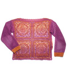 a purple sweater with orange and pink squares on the front, sitting on a white surface