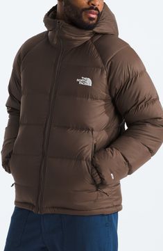 Stay dry in this expedition-tested puffer coat with a durable water-repellent finish and cozy 600-fill power down insulation to shield you from the cold. 27" length (size Medium) Stand collar; fixed hood 30-denier 45 g/m² taffeta shell with PFC-free durable water-repellent (DWR) finish Lined, with 600-fill-power down fill 100% nylon Machine wash, tumble dry Imported PFC-free, durable water-repellent coating is free of per- and poly-fluorinated chemicals, some of which can be harmful to the envir The North Face Down Puffer Jacket, The North Face Long Sleeve Down Puffer Jacket, The North Face Down Puffer Jacket With Detachable Hood, The North Face Functional Puffer Jacket With Detachable Hood, The North Face Down Puffer Jacket For Outdoor, The North Face Hooded Nylon Puffer Jacket, Brown Down Outerwear For Outdoor, Brown Down Outdoor Outerwear, Midweight Down Puffer Jacket With Long Sleeves