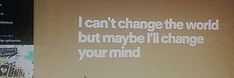 a man standing in front of a projection screen with a quote on it that reads i can't change the world but maybe i'll change your mind