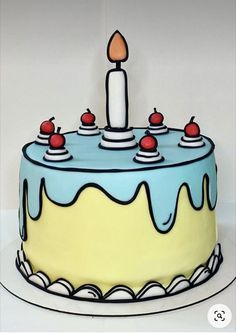 a blue and yellow birthday cake with an apple on top that has a candle in the middle