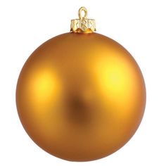 a golden christmas ornament hanging on a white background