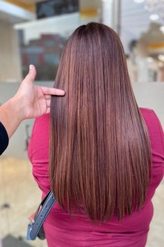 Woman with long straight brown hair highlighted with red and blonde. Pretty Brunette Hair, Red And Blonde Highlights, Brown Hair With Red, Red And Blonde, Auburn Highlights, Highlights Ideas