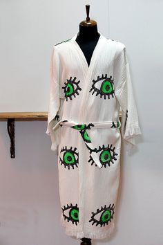 Purpose of usage; Turkish cotton robe, spa bath, boho robe, bridesmaids robes, bridal party robes, robes for woman & for man, wedding robe, bridesmaid gift Made of %100 Cotton  Dries very quickly, soft and light, Eco friendly, absorbs water better than towel. Standart size Care:  -You can wash in cool water 30C to 40C. Please do not use bleach or fabric softener. - Dry naturally. Don't machine dry! - Colors on your monitor may differ slightly from the original. The peshtemal bathrobe absorbs water as fast as a traditional towel, dries very quickly, takes up less space, is easy to carry and is therefore used as an alternative to the towel in bathrooms, pools, spas, beaches, and sports facilities A peshtemal is a traditional towel used in baths. A staple of Ottoman Hamam culture, dating back White Printed Kimono For Loungewear, White Robe With Kimono Sleeves For Home, Bohemian White Sleepwear For Daywear, Long White Robe For Home, Bohemian Cotton Kimono For Sleep, Bohemian Cotton Sleep Kimono, Bohemian Cotton Robe For Home, White Bohemian Cotton Robe, White Bohemian Kimono For Home