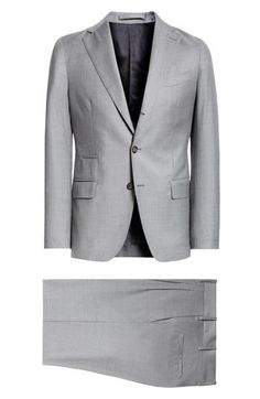 This Italian-crafted suit done in a single-breasted silhouette is tailored from wool and fashioned with notched lapels for a comfortable, polished look. Jacket has three-button closure; notched lapels; chest welt pocket; welt ticket pocket; front flap pockets Trousers have zip fly with button closure; front slant pockets; back welt pockets Partially lined 100% wool Dry clean Made in Italy Designer Clothing Wool Suit With Notch Lapel And Structured Boning, Wool Suit With Structured Boning And Notch Lapel, Wool Suits With Structured Boning And Notch Lapel, Timeless Notch Lapel Suits For Business Trips, Timeless Wool Suit With Flat Front, Fitted Suits With Pressed Crease For Business Trips, Timeless Wool Flat Front Suit, Classic Tailored Wool Suit And Tie Accessories, Tailored Classic Wool Suit And Tie Accessories