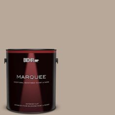 behr marquee interior paint in one gallon, with the light shining on it