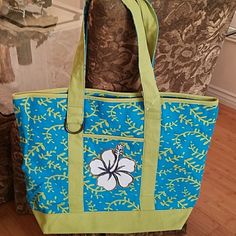 Great Color Hibiscus Applique Done By Me Sturdy Canvas Material Front Pocket With 1 Zip Pocket Inside Snap Top Closure Has Key Ring 19 1/2 X 15 X 6 1/2 Note: Small Stain In Back Blue Tropical Bag For Vacation, Blue Tropical Style Bag For Vacation, Tropical Blue Bag For Vacation, Blue Tropical Rectangular Bag, Blue Tropical Vacation Bag, Blue Tropical Style Vacation Bag, Tropical Blue Rectangular Bag, Tropical Blue Bag For Everyday Use, Beach Tote Bag