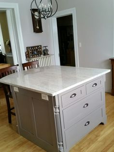 a large kitchen island in the middle of a room