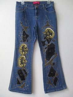 "HAND-EMBELLISHED Glo Denim Blue Floral Design Embellished JEANS ✽ ✽ ✽ Original Floral Print Design, Hand-embellished by Iva Boutique ✽ ✽ ✽ BRAND - Glo SIZE - 9 short MATERIAL  ---- 75% cotton  23% Polyester 2% spandex WAIST------------30\" HIPS ------------ 38\" RISE ------------- 9\" INSEAM -------- 28 1/2\" PATTERN ------- floral print CONDITION ----- new MATERIAL ------- sequin & glue glitter CLOSURE ------- front zipper PACKETS --------- front & back pockets WASH ----------- hand cold wash Straight Leg Denim Sequined Bottoms, Straight Leg Denim Bottoms With Sequins, Sequined Straight Leg Denim Bottoms, Embellished Party Jeans, Straight Leg Sequin Denim Jeans, Straight Leg Denim Jeans With Sequins, Sequined Straight Leg Denim Jeans, Mid-rise Denim Jeans For Party, Embellished Denim Bottoms For Fall