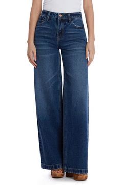 Effortlessly cool and casual-chic, these nonstretch jeans flaunt a high waist and full-length wide legs that create a dramatic silhouette. 32" inseam; 24" leg opening; 10 1/2" front rise Zip fly with button closure Five-pocket style 100% cotton Machine wash, tumble dry Imported Modern Dark Wash Full-length Bottoms, Modern Full-length Dark Wash Bottoms, Modern Full Length Dark Wash Bottoms, Modern Dark Wash Wide-leg Flare Jeans, Modern Flare Denim Jeans, Modern Full-length Denim Flare Jeans, Modern Full Length Denim Flare Jeans, Dark Wash Wide Leg Pants With Five Pockets, Dark Wash Full Length Flare Jeans