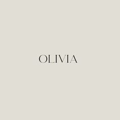 the word oliva written in black ink on a gray background with an image of a