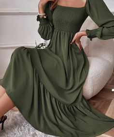 The chicest maxi dress for fall that features a square smocked bodice - which fits beautifully above bumps of all sizes. This boho vibe style with a hemmed ruffle will look gorgeous for fall photos and baby showers! Wear postpartum too. Color: Army Green, Brown Maxi length 100% Polyester Sizes: XS (0-2), S (4-6), M (8-10), L (12-14), XL (16-20) Questions? Use the chat icon to connect with a stylist. Business Formal Dress, Bodice Dress, Formal Dresses Gowns, Professional Dresses, Ruffle Hem Dress, Ruffled Maxi Dress, Maxi Dress With Sleeves, Hem Dress, Ball Dresses