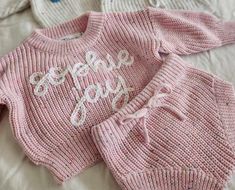 Additional colors can be found in the "INFANT" section. STRAWBERRY- Custom Name Hand Embroidered Sweater Sets for Newborns- Includes a 0-3 months sweater and bloomer shorts. These knits are made of 100% cotton and are the perfect way to introduce your precious baby to the world! We also have the plain option, which is perfect to throw on for any occasion.  Shop the booties and toboggan for the full set.  MATERIALS: Our hand embroidered sweater sets are one-of-a-kind.  These sweater sets are made from 100% cotton and are incredibly soft, making them perfect to bring home your precious newborn in! They are also perfect for pregnancy and birth announcements, family photos and make the best baby shower gift! FIT: Sets are size 0-3 months and are custom made to fit the range of all newborns.  T Birth Announcement Outfit, Embroidered Baby Sweater, Announcement Outfit, Sweater Shorts, Sweater Sets, Bloomer Shorts, Personalized Sweater, Pull Bebe